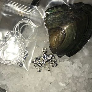 Elephant pearl cage with chain and oyster